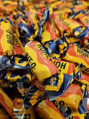 BAYSIDE CANDY Bits of Honey taffy with real honey and almond bits for a nostalgic treat.