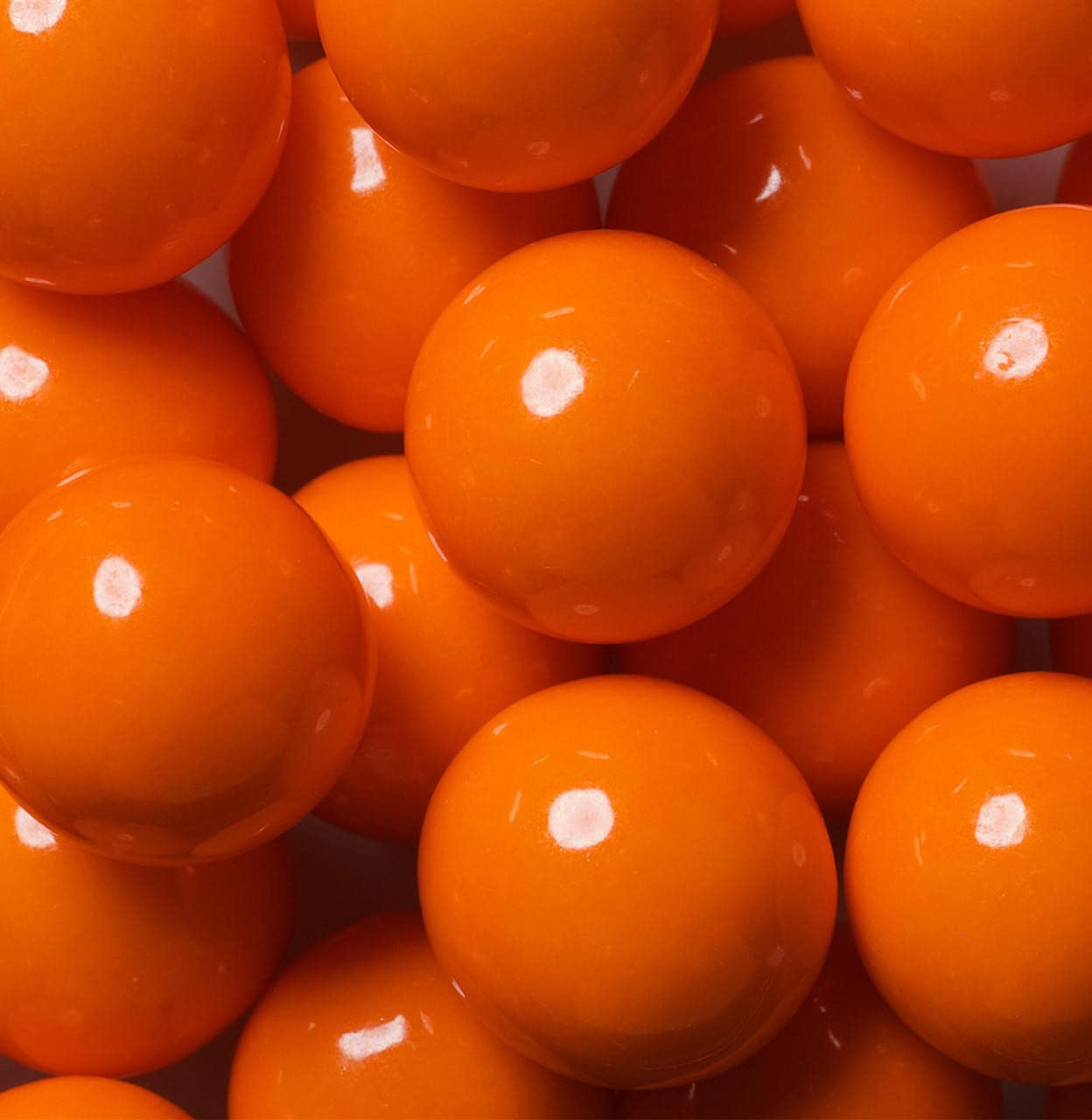 Bayside Candy orange gumballs 1-inch party favor, a quick sweet treat for guests.