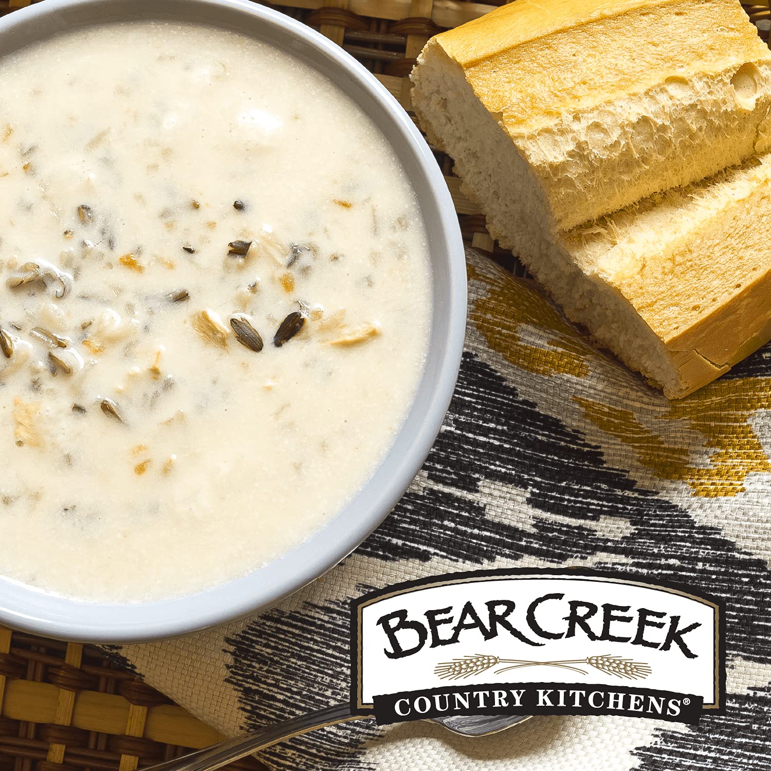 Bear Creek Creamy Wild Rice spoon close-up, creamy texture ready to serve.