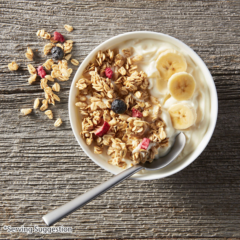 Close-up of Bear Naked Triple Berry Granola crunch with mixed berries.