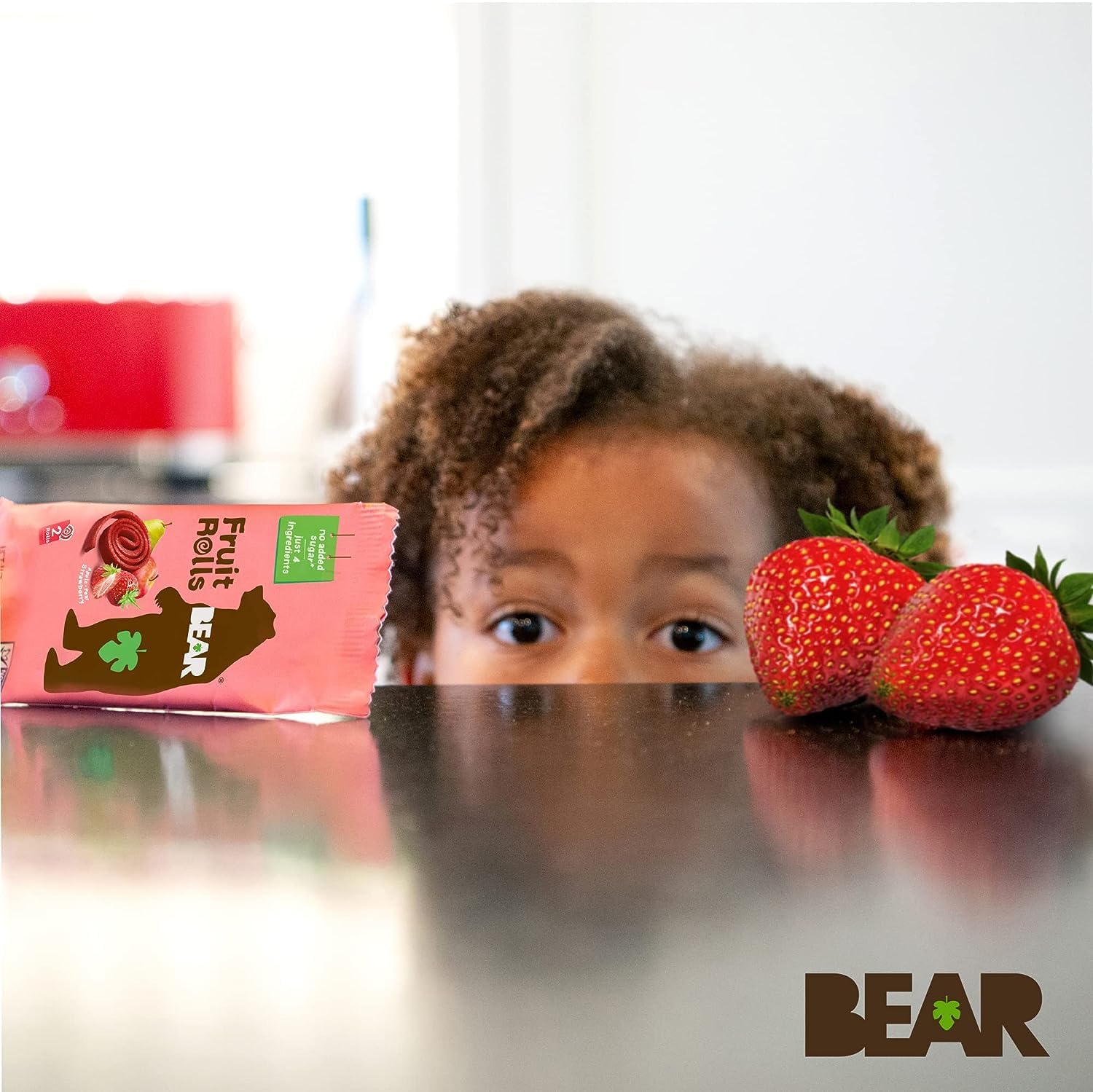 BEAR Real Fruit Snack Rolls strawberry no added sugars label visible.