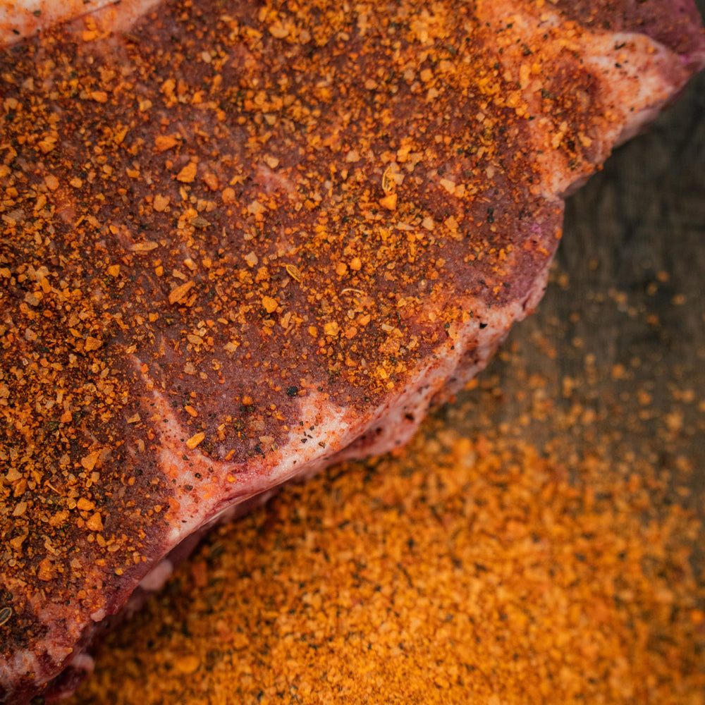 Bearded Butcher Bold Blend on fries, enhances crisp, flavorful bite.