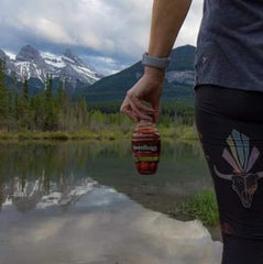 Beetology 6-pack packaging sits on a store shelf, offering convenient on-the-go refreshment.