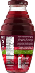 Beetology beet and cherry juice pour into a glass, ideal for smoothies and cocktails.