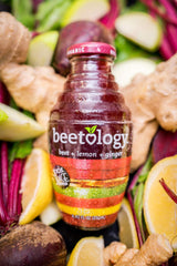 Beetology Beet Cherry bottle front emphasizes antioxidant-rich sip for energy and refreshment.