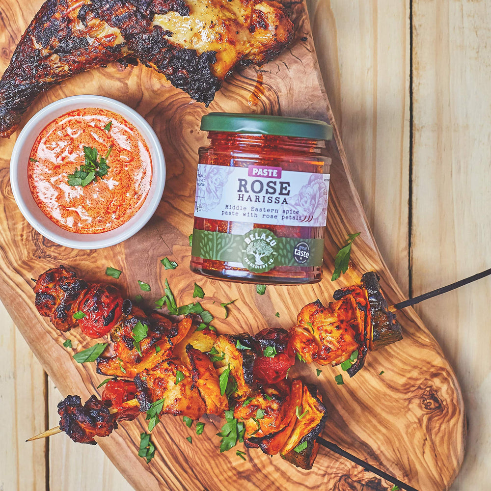 Belazu Rose Harissa served in a dish enhances flavor and color