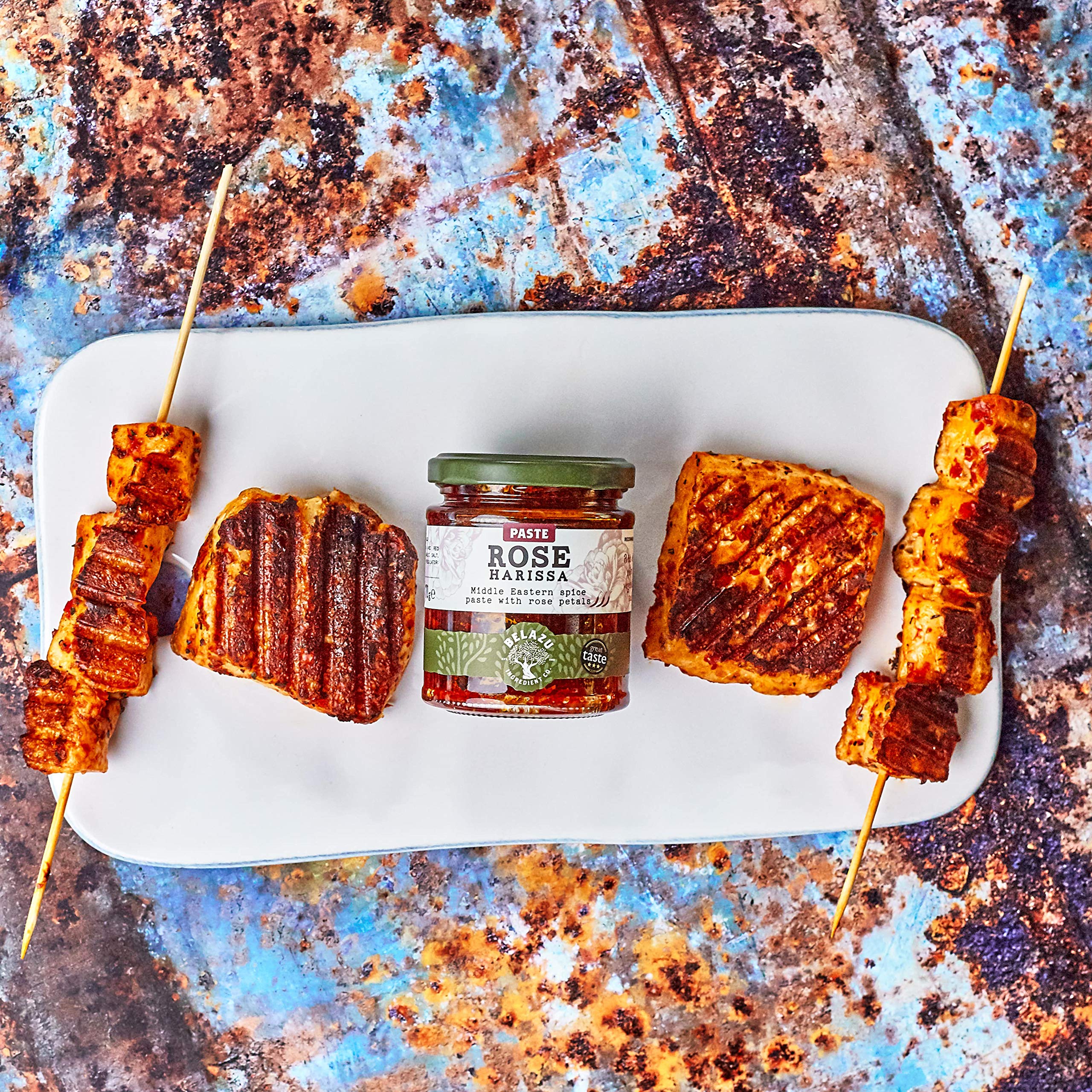 Open Belazu Rose Harissa jar with spoon for quick heat