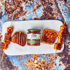 Open Belazu Rose Harissa jar with spoon for quick heat