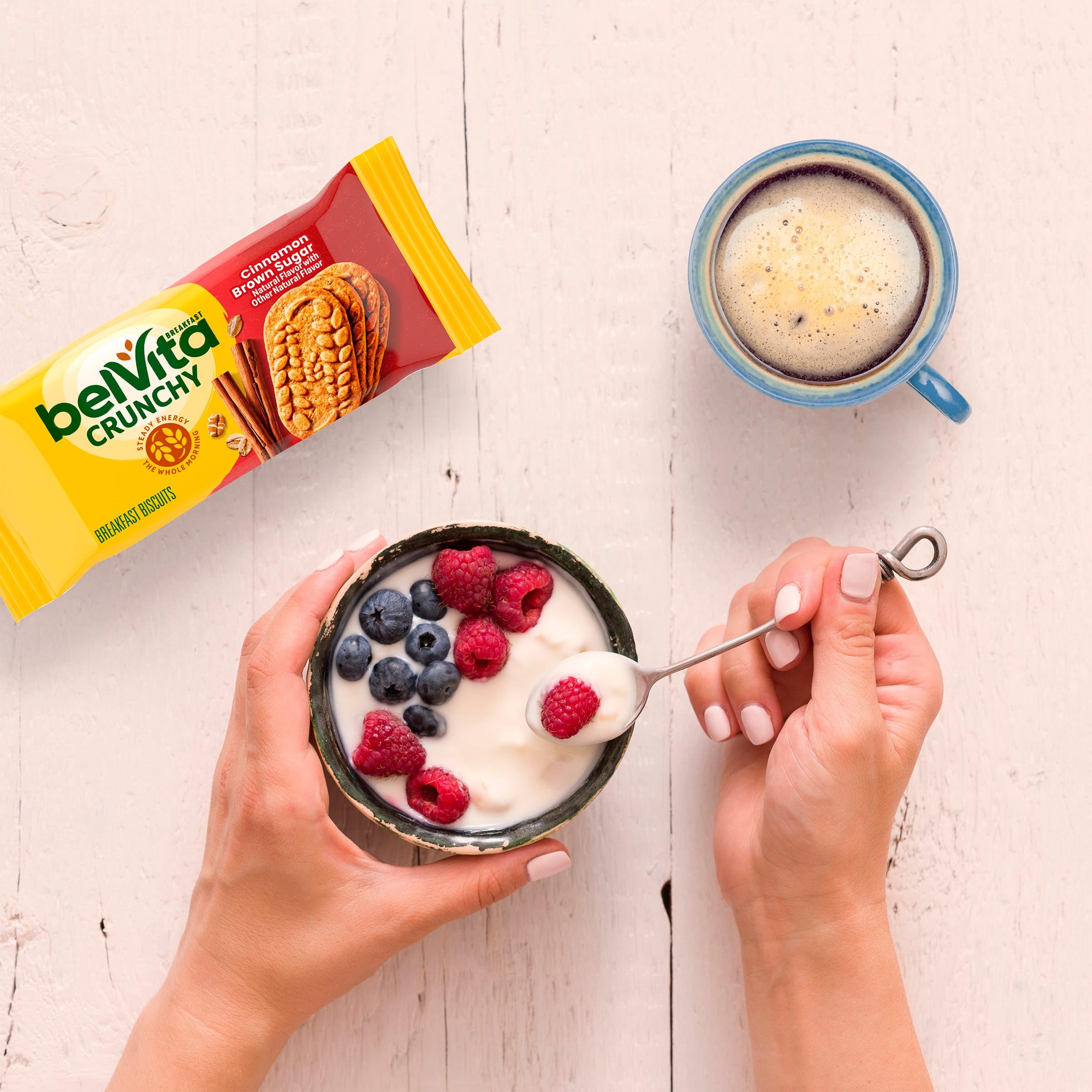 Belvita breakfast biscuits with yogurt and fruit for a balanced breakfast idea.