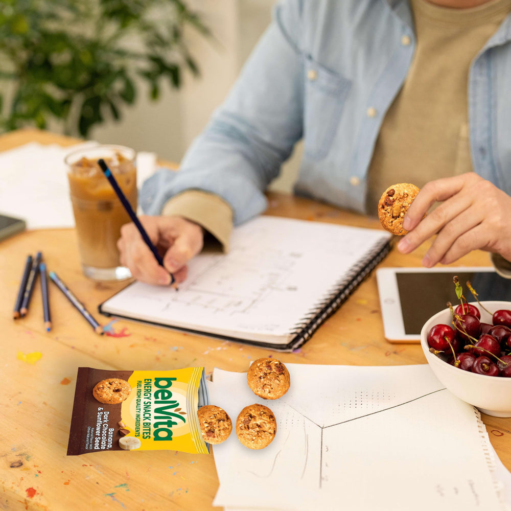 Whole-grain illustration emphasizing nutritious base of Belvita bites.