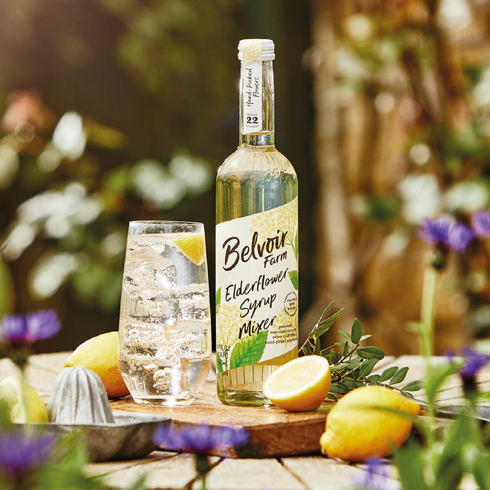 Belvoir Elderflower Syrup bottle with spoon, ready to mix.