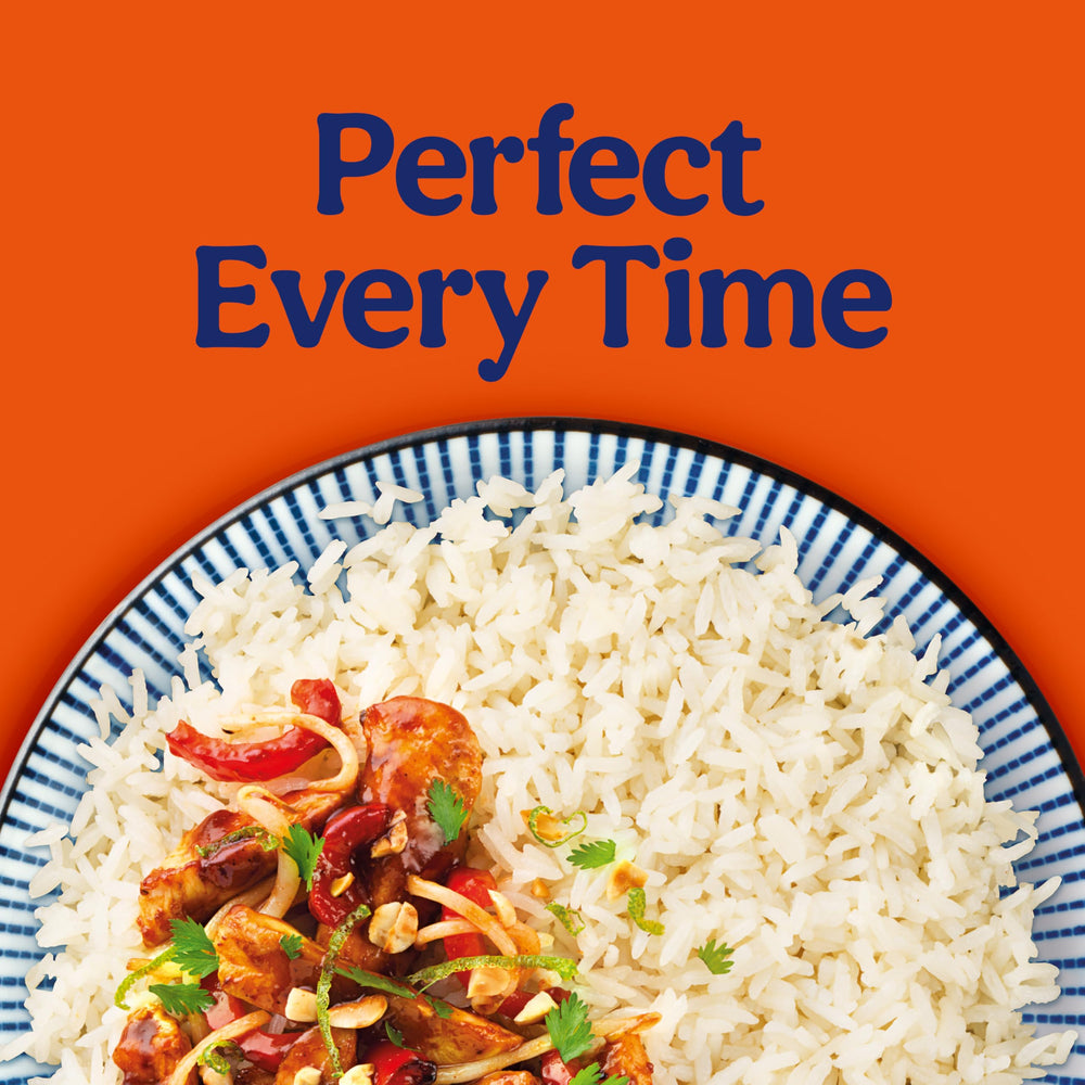 BEN'S ORIGINAL Ready Rice Coconut Jasmine plated beside a colorful entree.