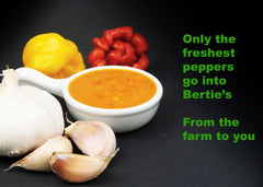 Bertie's Original Pepper Sauce bottle label close-up showing authentic fruit-forward flavor.