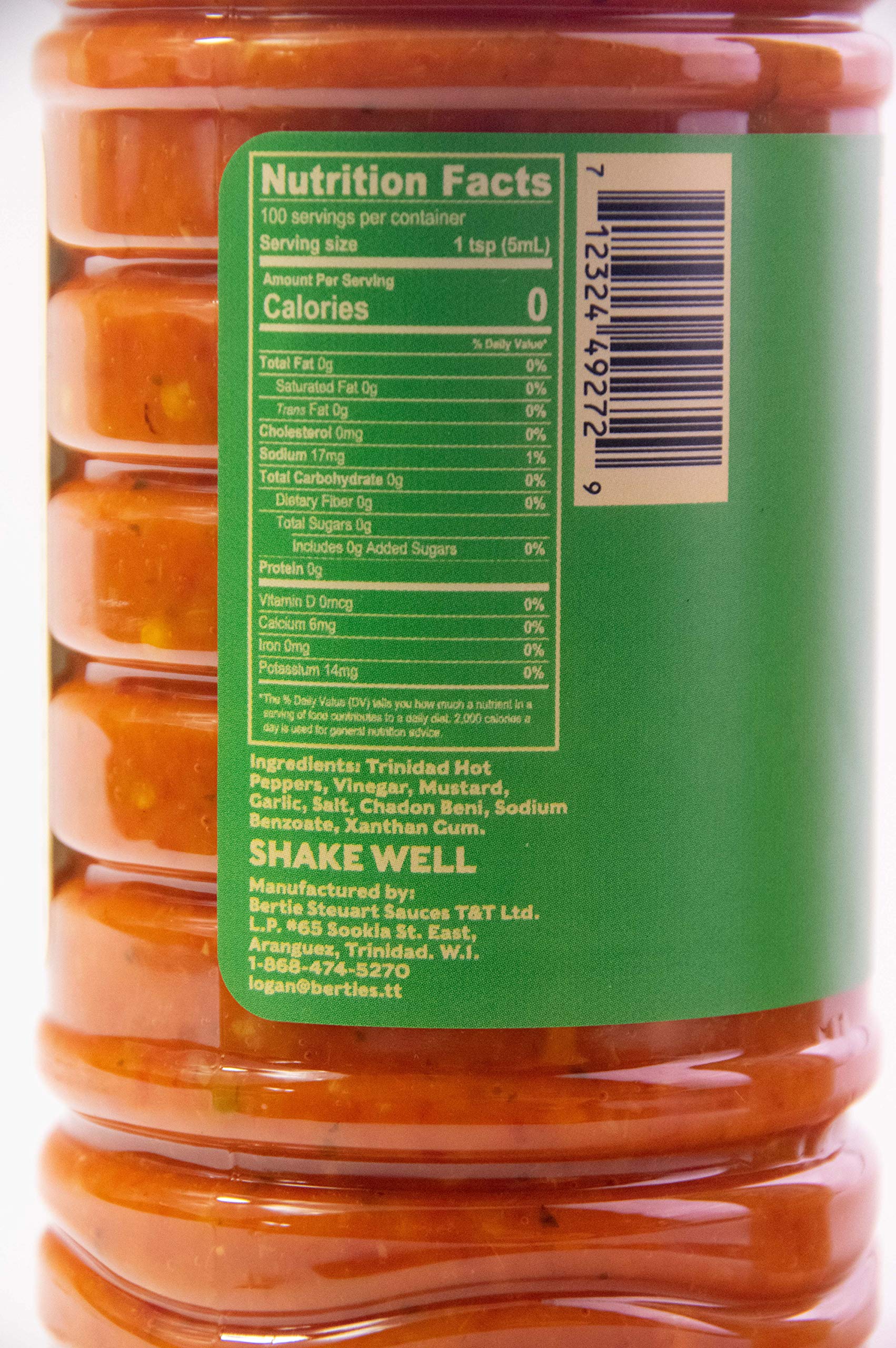 Bertie's Original Pepper Sauce bottle pour captures easy drizzle for marinades and seasoning.