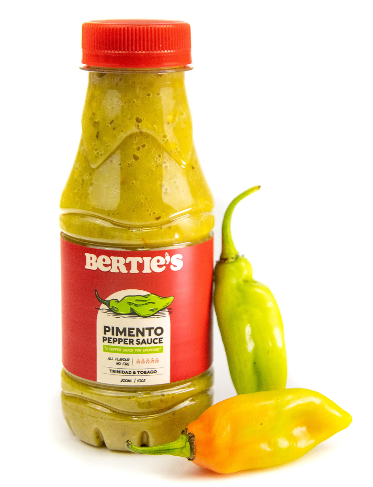 Berties Trinidad Pimento Sauce bottle pour highlights mild flavor without heat