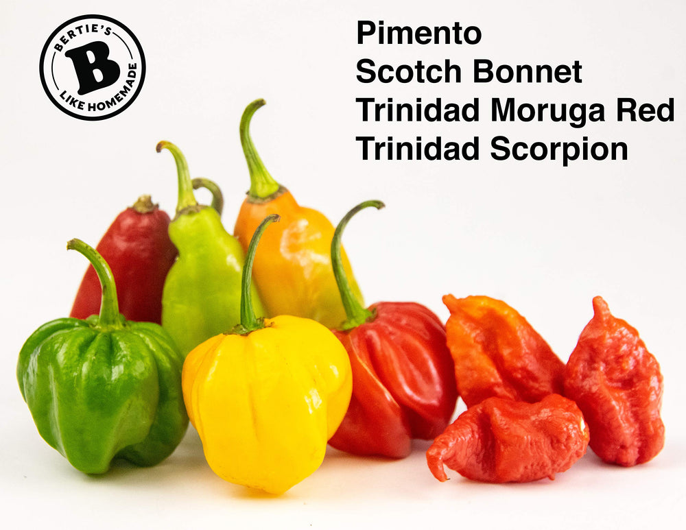 Berties Trinidad Pimento Sauce ingredients close-up featuring fresh peppers and aromatics