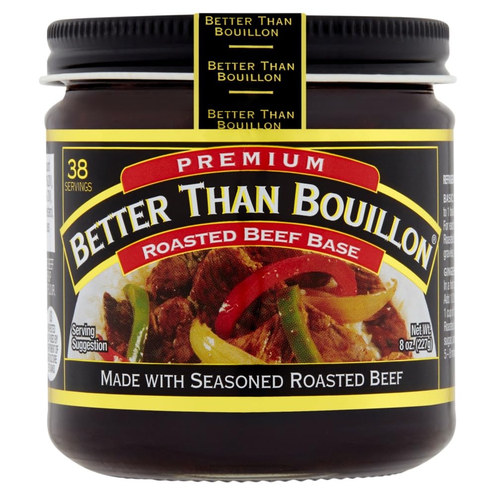 Better Than Bouillon Base spooned from the jar for controlled seasoning.