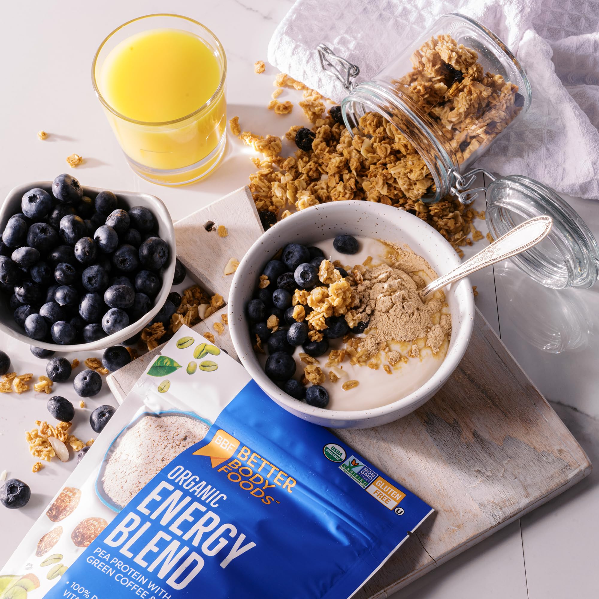 BetterBody Foods Organic Energy Blend poured into smoothie with vibrant color and texture.
