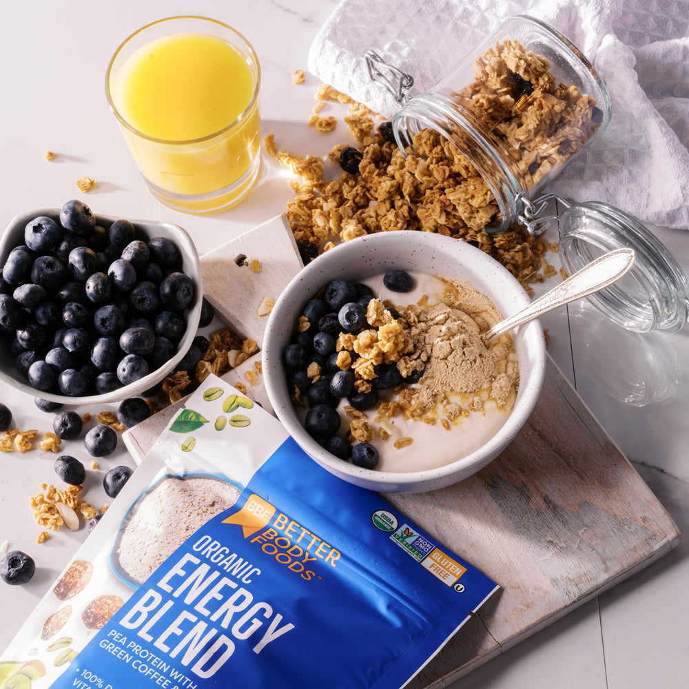 BetterBody Foods Organic Energy Blend poured into smoothie with vibrant color and texture.