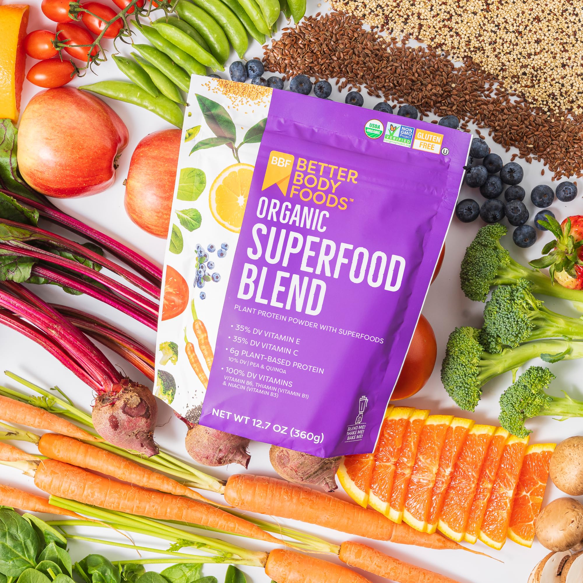 BetterBody Foods Organic Superfood Powder being poured for a smoothie boost.