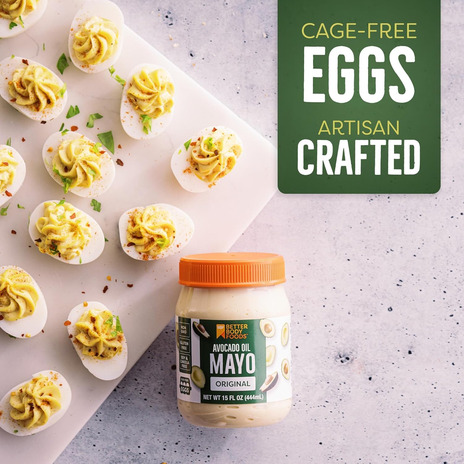 BetterBody Foods Avocado Oil Mayonnaise drizzle over a burger patty for added moisture.