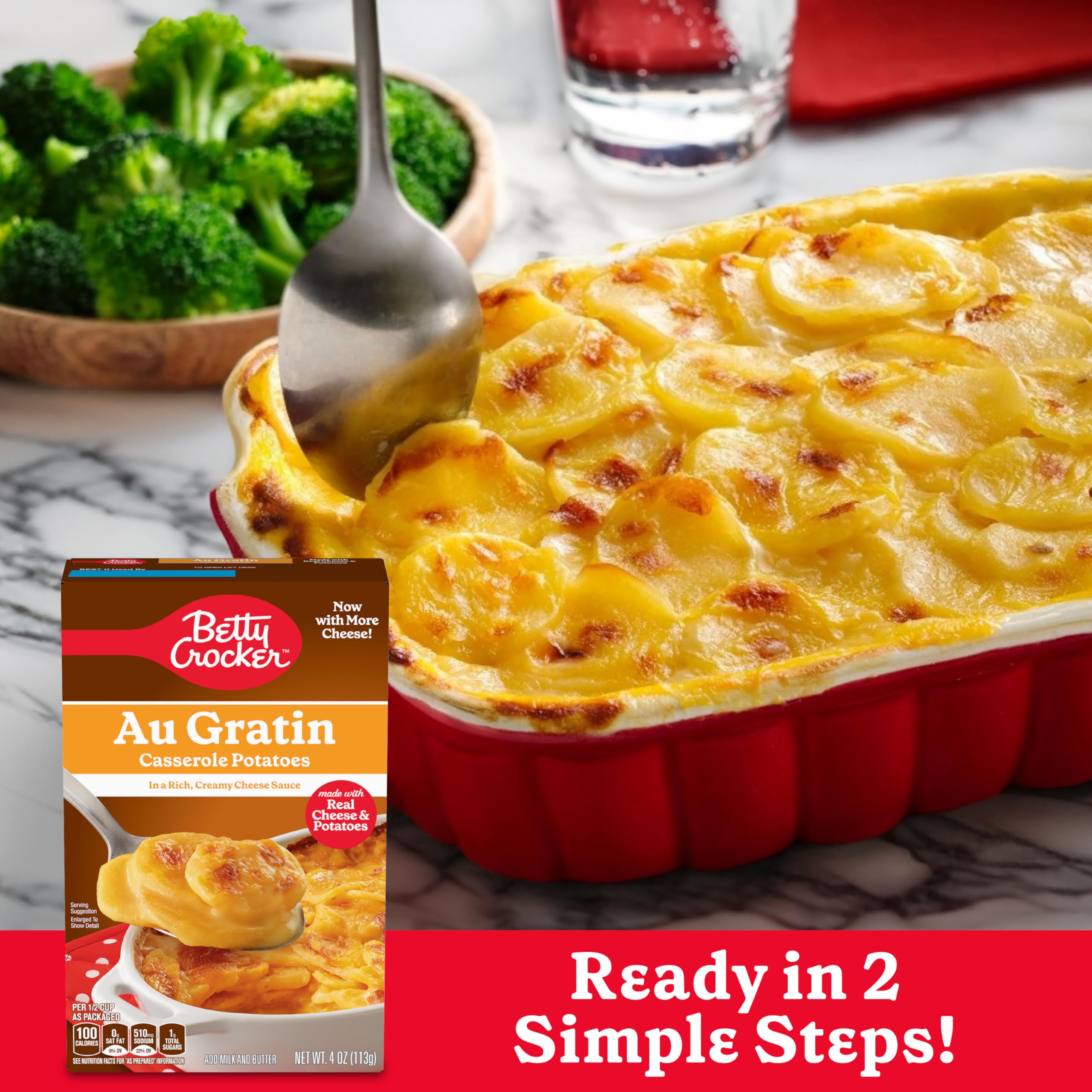 Betty Crocker Au Gratin Potatoes being prepared with boiling water and butter.