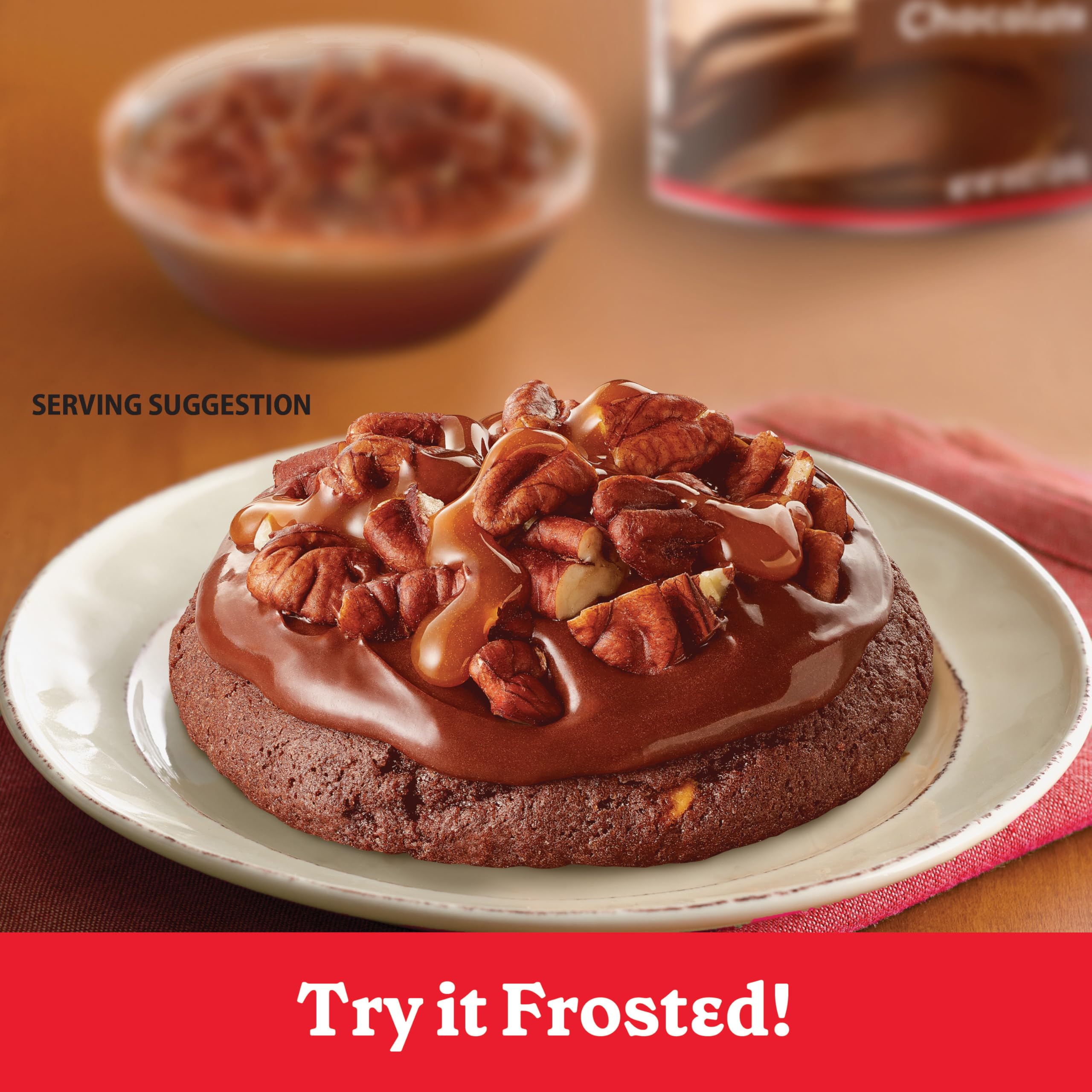 Betty Crocker cookies topped with frosting and chopped pecans.