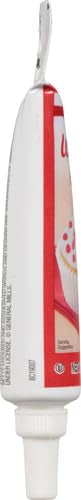 Betty Crocker Decorating Gel Red applied to icing for high-contrast details.