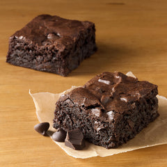 Betty Crocker Delights Supreme Chocolate Chunk Brownie Mix bowl with dry mix and ingredients laid out