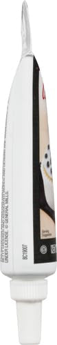 Betty Crocker black gel icing highlighting cake borders with a glossy finish.