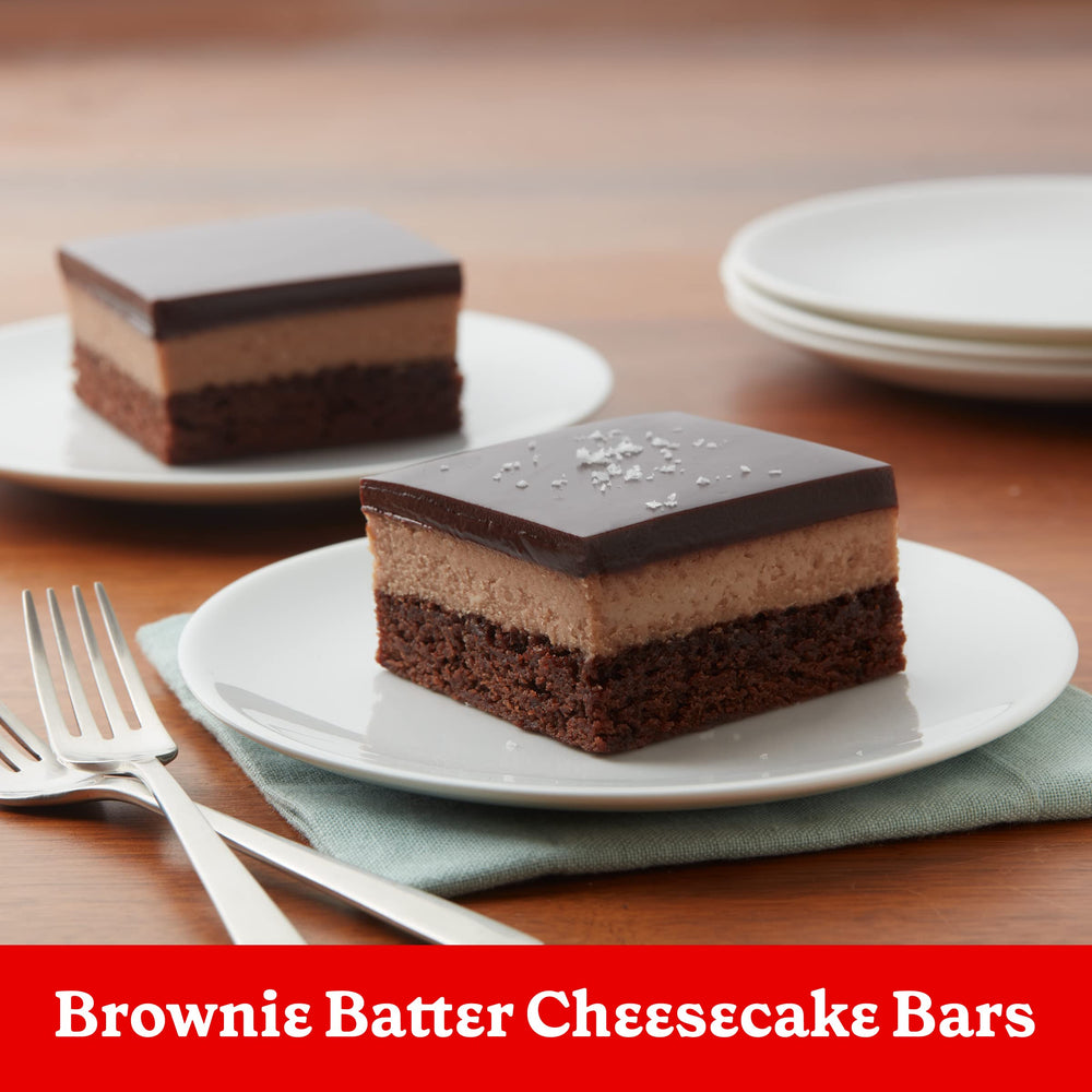 Pouring Betty Crocker brownie mix into a bowl for quick prep