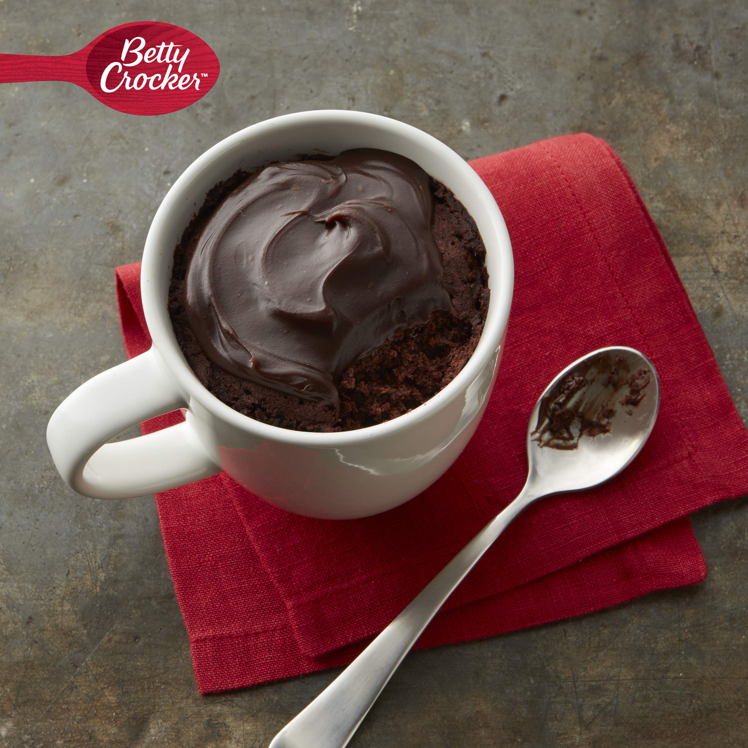 Fudge frosting closeup on Betty Crocker Mug Treats cake mix box