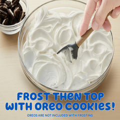 Betty Crocker OREO Crème Frosting smooth spread on a birthday cake.