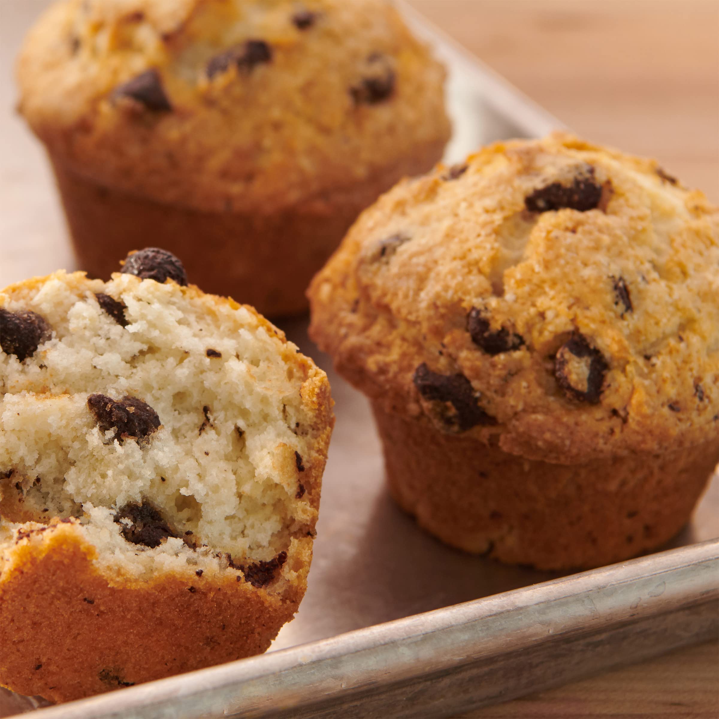 Betty Crocker quick bread mix batter on counter, promising warm, chocolatey slices.