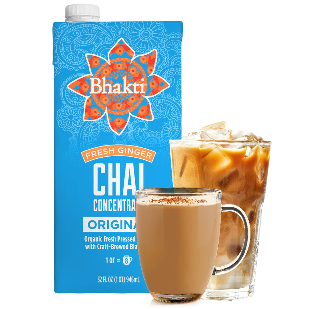 Bhakti Chai Tea Concentrate bottle being poured for a creamy latte