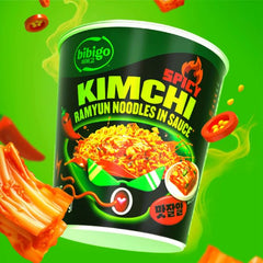 Bibigo Ramyun seasoning packet closeup showing balanced heat.