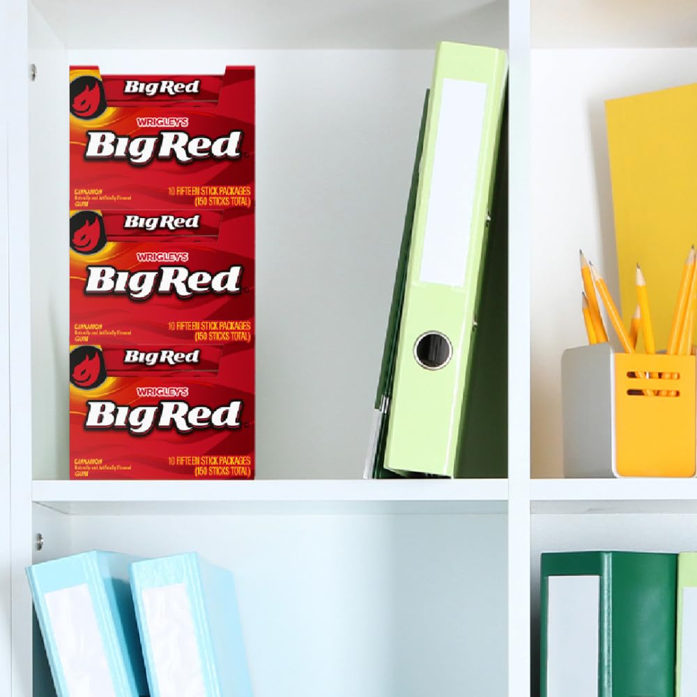 BIG RED cinnamon gum on a desk with packs for easy access.
