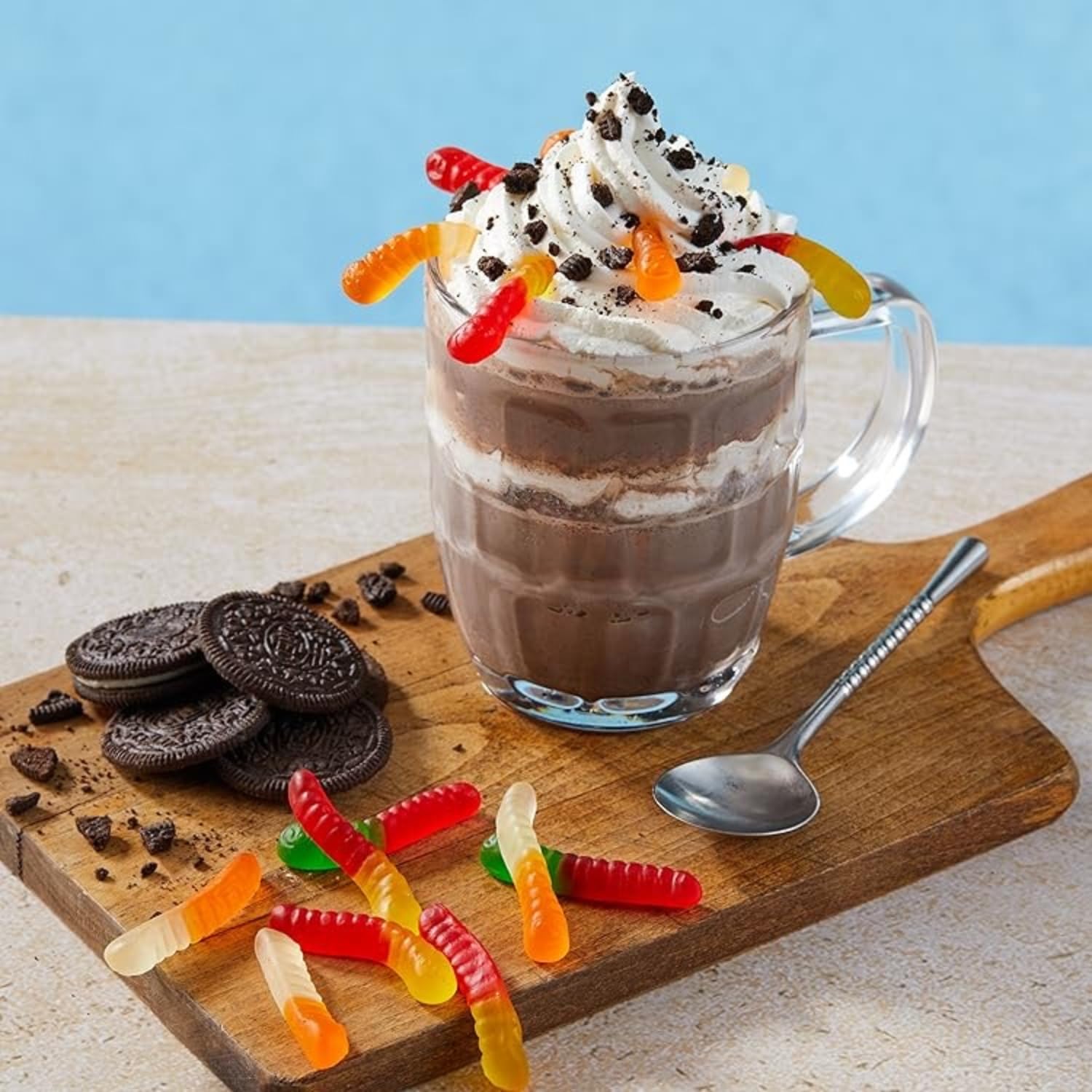 Serving Big Train Cookies N Cream frappe with iced coffee and cream