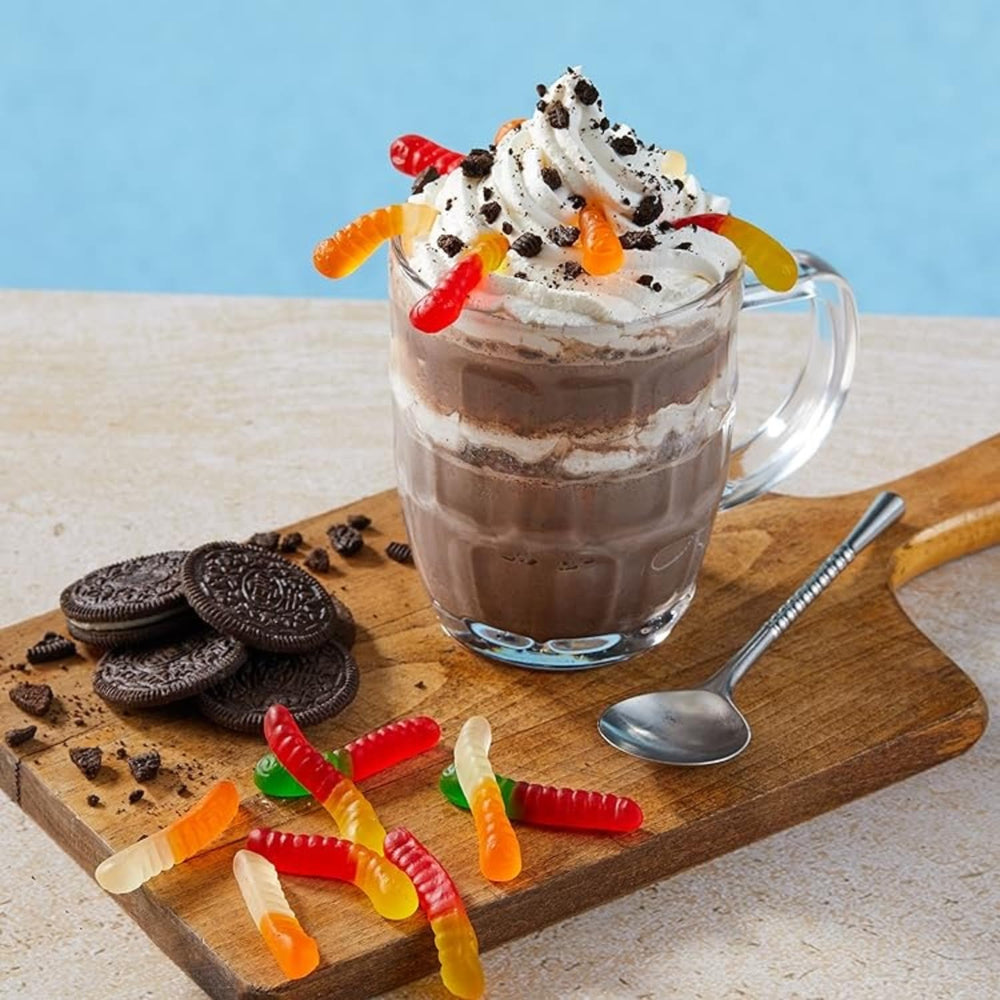 Serving Big Train Cookies N Cream frappe with iced coffee and cream