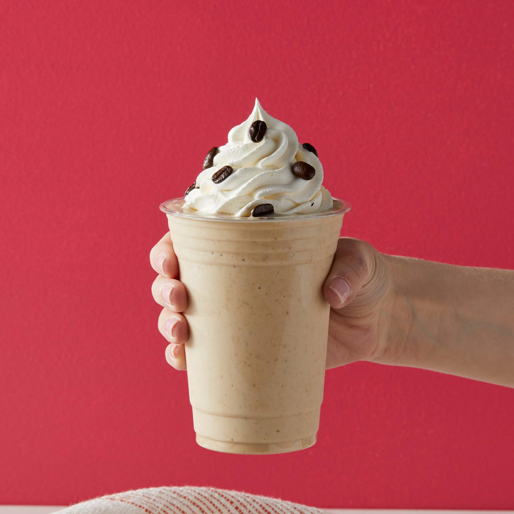 Big Train Vanilla Latte dispense-measure demonstrating simple scooping.