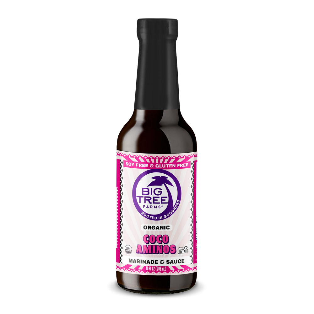 Big Tree Farms Coco Aminos bottle pour enhances umami in marinades.