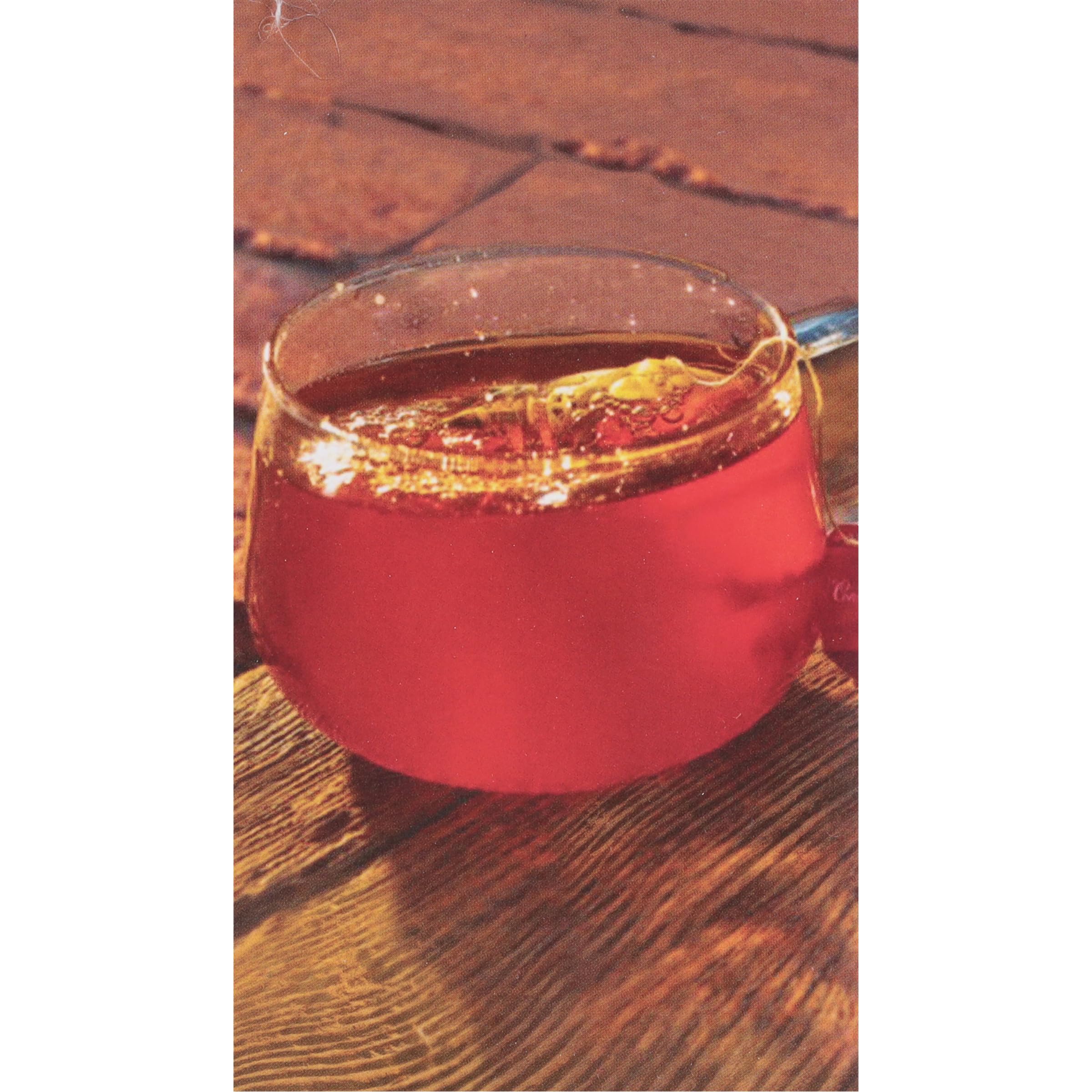 Brewing Constant Comment yields a warm, citrus-spice aroma in a mug