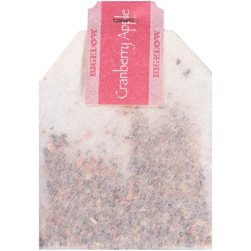 Illustration of cranberries, apples, and hibiscus representing the herbal blend.