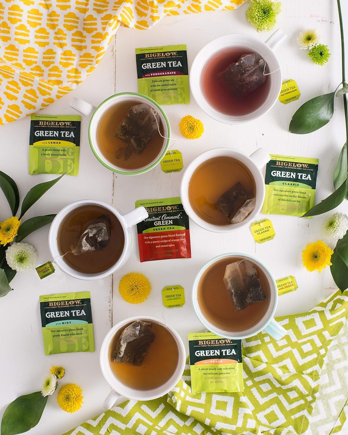 Bigelow Green Tea with Lemon in a glass cup for bright, citrus-infused refreshment.