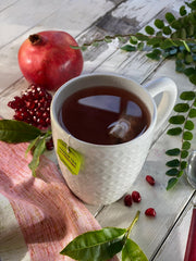 Bigelow Green Tea with Pomegranate boxes showcase convenient six box pack.