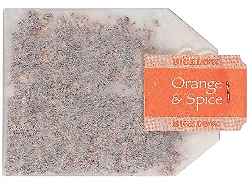 Bigelow Orange and Spice Herbal Tea at the office desk promotes a comforting moment during work.