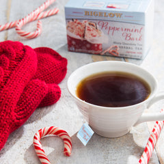Bigelow Peppermint Bark hot tea in a cup with aroma.