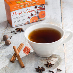Close-up of Bigelow Pumpkin Spice Black Tea bags, individually wrapped for freshness.