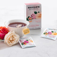 Brewing Bigelow rose-mint tea in a cup to release calming aromas