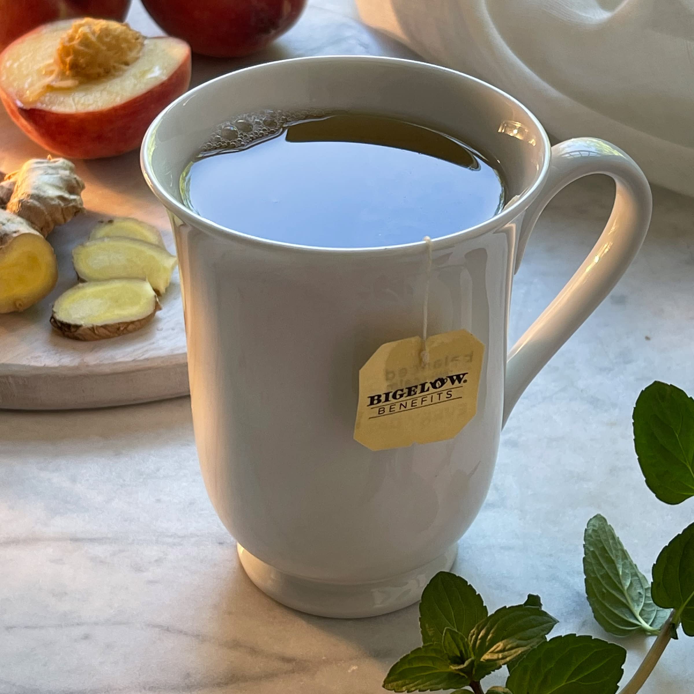 Bigelow Benefits caffeine-free blend label on a mug highlights daily, relaxing enjoyment